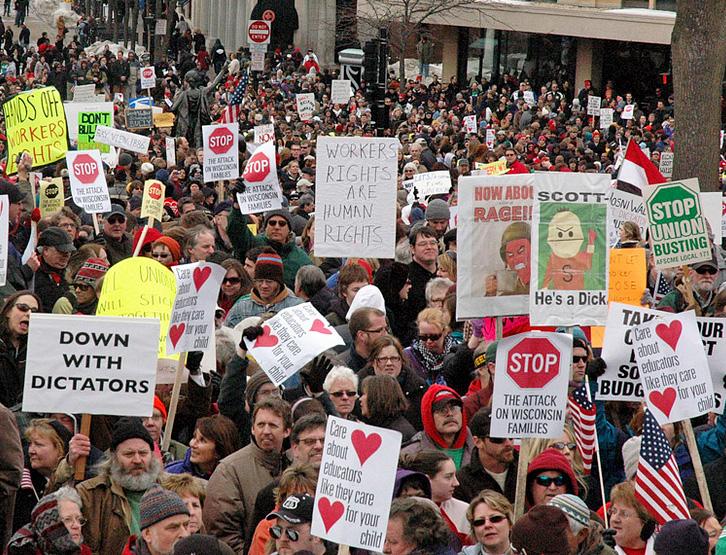 Some 20,000 people rallied against Gov. Scott Walker's sweeping attacks on unions and workers' living standards