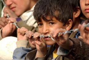 An Afghan boy from the village of Aroki