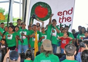 CIW staffer Lucas Benitez speaks to the final rally of the action at a Lakeland church
