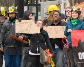 Occupy Charlotte marches against restrictive new laws criminalizing protest