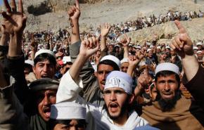Afghans assemble in a mass protest in Ghani Khail