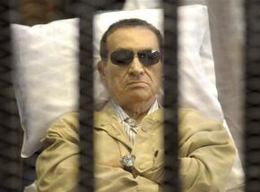 Hosni Mubarak in court as the verdict in his case is read